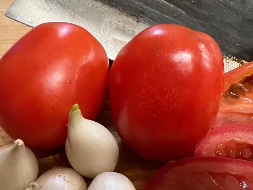 Vista 6 de Semillas de tomate Roma VF Heirloom Non GMO 250 Seeds Se envía en envases de papel reciclado compostable