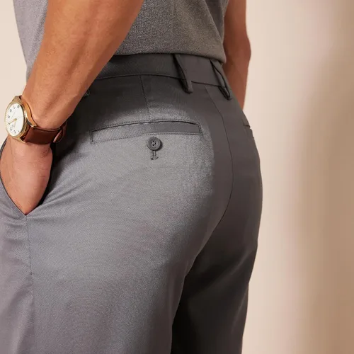 Vista 4 de Tienda Essentials Pantalones cortos de golf elásticos ajustados para hombre
