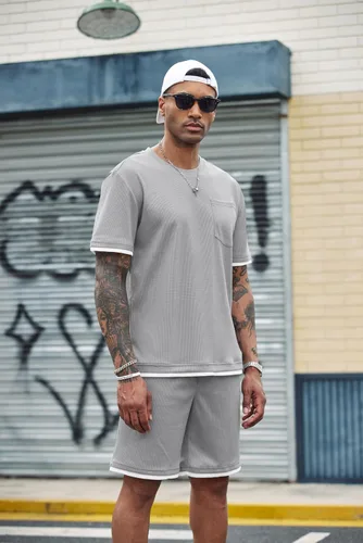 Vista 21 de COOFANDY Conjunto de camisa y pantalones cortos de gofre para hombre, conjunto de 2 piezas, conjunto casual de verano con bolsillos