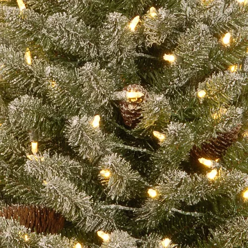 Vista 3 de National Tree Company 3ft Pre-Lit Mini Flocked Artificial Christmas Tree 50 luces LED blancas cálidas, 130 puntas, piñas, temporizador, base