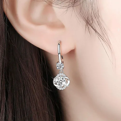 Vista 3 de 2023 New Temperament - Aretes creativos de cuatro hojas con diamantes largos, Metal Diamante Cobre