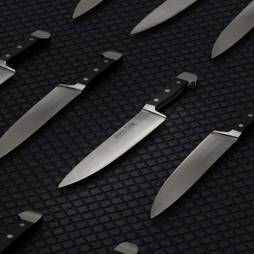 Vista 4 de Güde Alpha Series Cuchillo de chef forjado a mano/afilado con mango Hostaform negro de 10 pulgadas, fabricado en Solingen, Alemania desde 1910