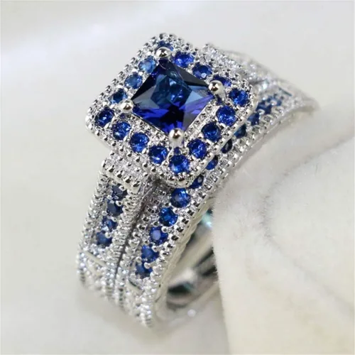 Vista 2 de Ai.Moichien Anillos de compromiso de boda con topacio azul y diamantes de imitación