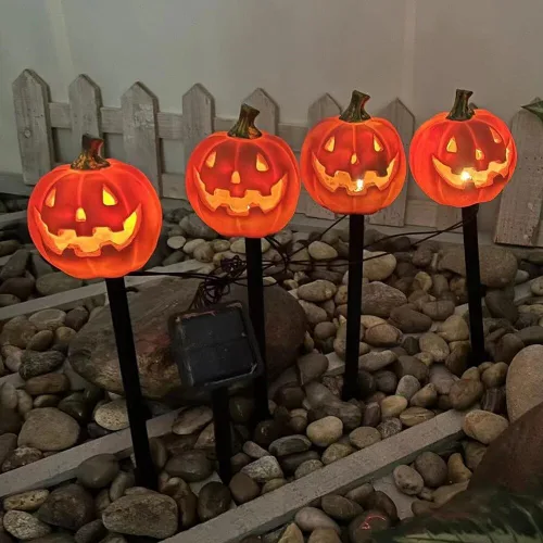 Vista 3 de Marcadores de camino de calabaza de Halloween, luces de cadena de luces alimentadas por energía solar, farol de resina con estacas de calabaza