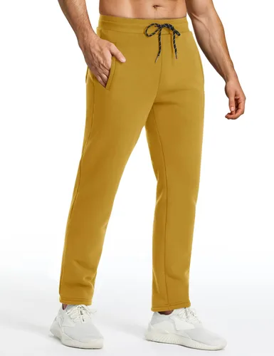 Vista 3 de FASKUNOIE Pantalones de forro polar de invierno para hombre, pesados y cálidos, con forro de sherpa, pantalones deportivos para correr con bolsillos