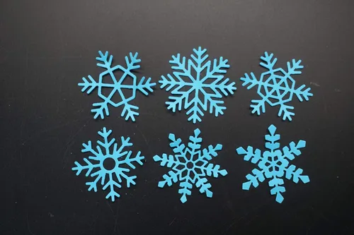 Vista 4 de Troqueles de metal para cortar copos de nieve, diseño de copos de nieve de seis formas diferentes, plantillas de plantillas para álbumes de recortes