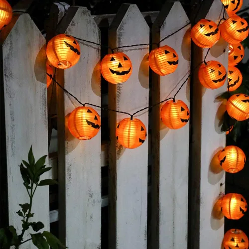 Vista 4 de Luces de calabaza de Halloween para exteriores, 2.6 m enchufables, luces de cadena naranjas para decoración de Halloween con 10 luces LED de Jack O