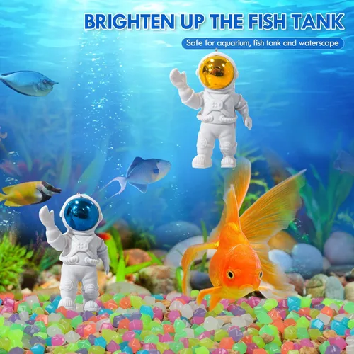 Vista 2 de Muzero Juego de decoración flotante para acuario de pecera, 100 guijarros que brillan en la oscuridad y 2 adornos flotantes de astronautas