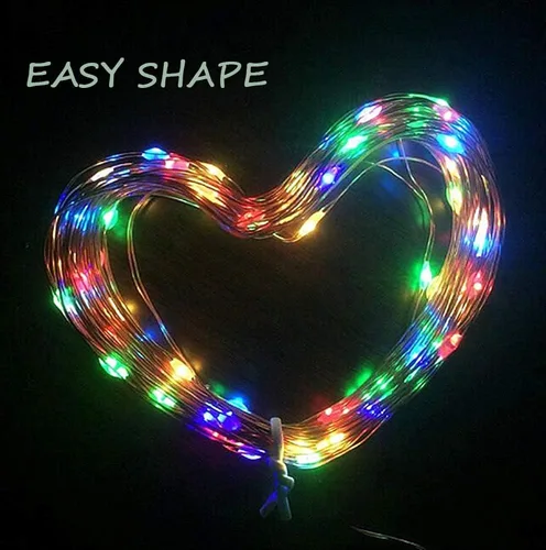 Vista 5 de iShabao Luces de Navidad multicolor para exteriores, 2 paquetes de 150 luces LED solares de Navidad de 49 pies, 8 modos de luces impermeables