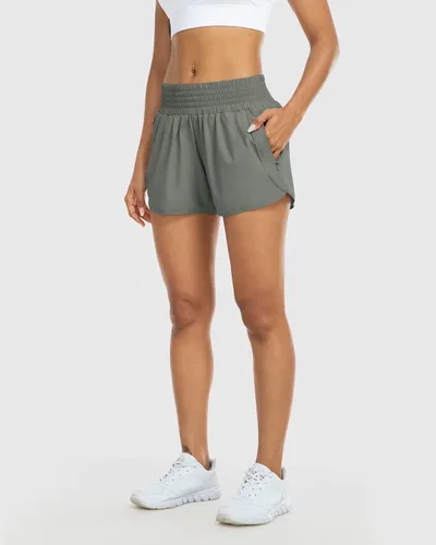 Vista 5 de YEZII Pantalones cortos deportivos para mujer con bolsillos, cintura alta, pantalones cortos de entrenamiento para correr, gimnasio, yoga