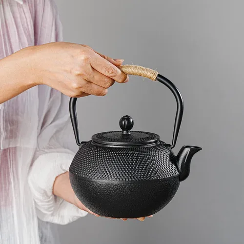 Vista 6 de Tetera japonesa de hierro fundido Sungmor - Tetera tradicional Tetsubin con infusor de acero inoxidable, tetera de hojas sueltas que retiene