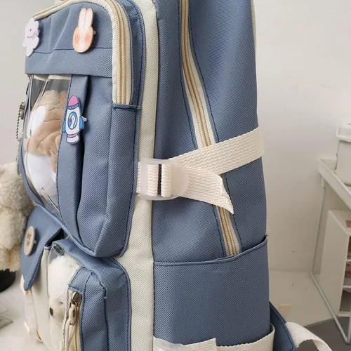 Vista 8 de Rcuyyl Mochila Kawaii con dijes y pines de accesorios, juego de 5 unidades, bonita mochila para mochila escolar, mochila de viaje de 17 pulgadas