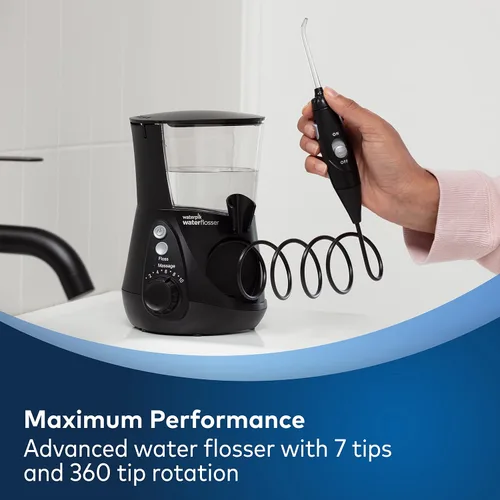 Vista 4 de Waterpik El irrigador dental acuario + puntas de reemplazo de prótesis de implantes - El sistema eléctrico de higiene dental elimina hasta el 99.9%