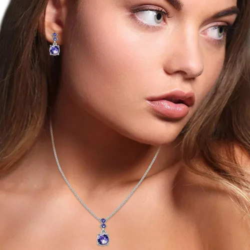 Vista 5 de NINE WEST Juego de collar y aretes en tono plateado y morado Diamante de imitación