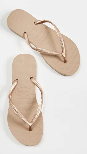 Vista 5 de Havaianas - Sandalia delgadas con diseño de la Mujer Maravilla para mujer, Oro Rosa