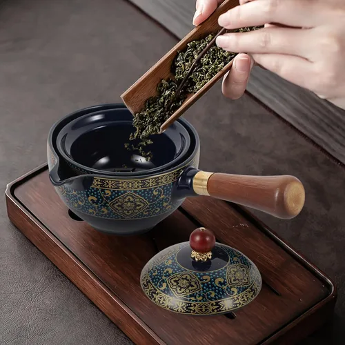 Vista 2 de Tetera de cerámica china clásica porcelana china gongfu juego de té de cerámica de rotación 360 con colador de té para té de hojas sueltas