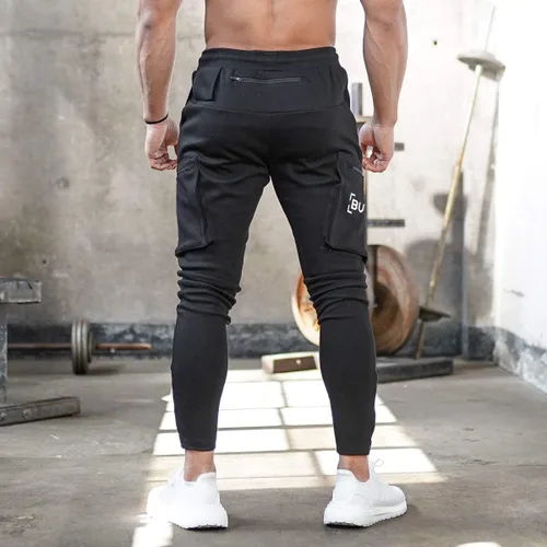 Vista 4 de AOTORR Pantalones deportivos de entrenamiento para hombre, pantalones deportivos para correr, pantalones deportivos casuales con bolsillos
