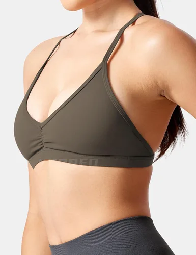 Vista 9 de YEOREO Sujetadores deportivos de entrenamiento para mujer con tirantes acolchados y espalda abierta, brasier de gimnasio ligero con tirantes