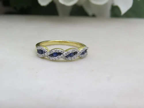 Vista 6 de Dazzlingrock Collection Anillo de aniversario apilable redondo de zafiro azul y diamante blanco para mujer en oro
