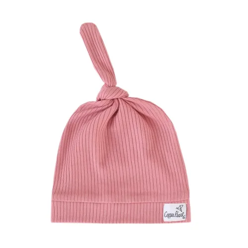 Vista 25 de Copper Pearl Gorro de bebé con nudo superior elástico suave Dolce