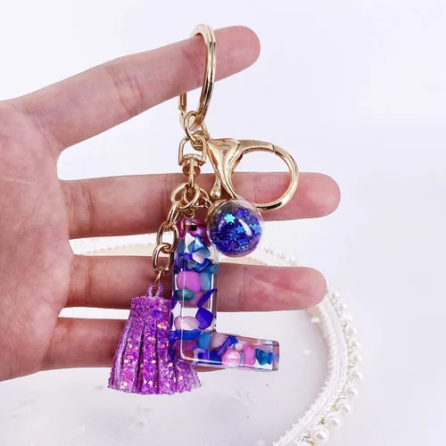 Vista 4 de LAXPICOL Llavero púrpura de la A a la Z para mujer, monedero, bolsos, resina, alfabeto inicial, letra colgante con borla, bola de cristal