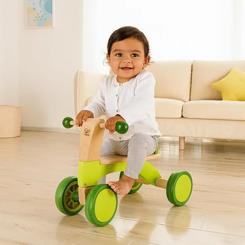 Vista 2 de Hape Scoot Around Ride On Bicicleta de madera Juguete galardonado de cuatro ruedas de madera para niños pequeños con ruedas de goma, verde