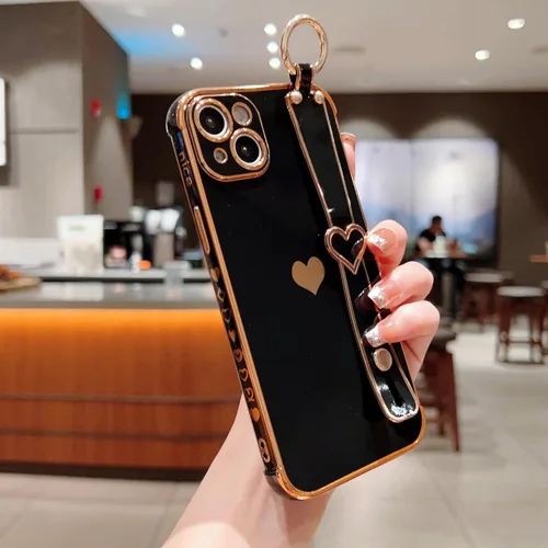 Vista 2 de DEFBSC Funda compatible con iPhone 15, con borde galvanizado, diseño de corazón con correa para la muñeca, protección completa de la cámara