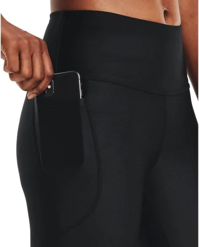 Vista 4 de Under Armour - Leggings capri con bolsillos para mujer, de tela HeatGear, de tiro alto y con pretina antideslizante