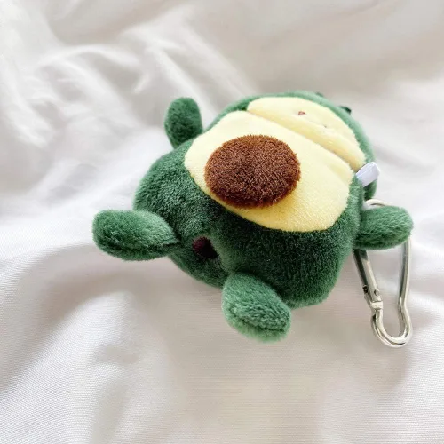 Vista 2 de Funda peluda SGVAHY para AirPods 1 y 2, diseño divertido de dibujos animados en 3D, diseño de aguacate verde suave y cálido, funda esponjosa
