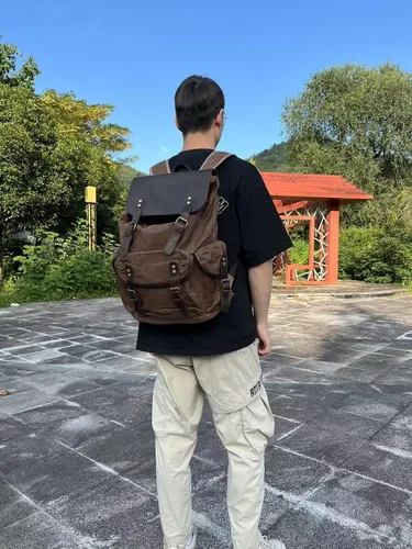 Vista 5 de Mochila de cuero genuino encerado de lona Lmagice para viajes, rústica para portátil en verde ejército Verde militar