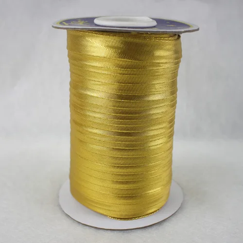 Vista 3 de Cinta de bies metálica de 0.591 in de un solo pliegue para coser 100% poliéster color sólido (dorado)