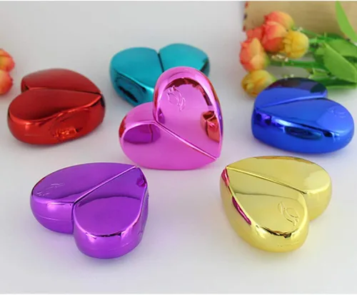 Vista 6 de VORCOOL Botella de spray portátil en forma de corazón de 0.8 fl oz, carcasa de metal, atomizador de perfume vacío recargable para viajes (rosa)