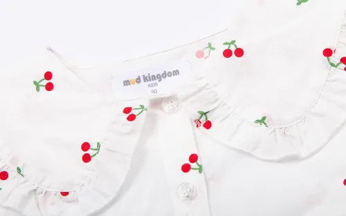 Vista 5 de Mud Kingdom Blusa de algodón con cuello Peter Pan para niñas pequeñas, manga corta con botones