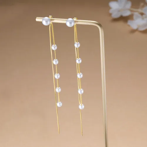 Vista 2 de SLUYNZ Aretes colgantes de plata de ley 925 con perlas de concha de imitación para mujer, elegantes aretes largos con borlas, aretes colgantes
