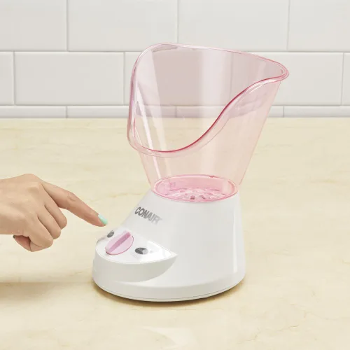 Vista 4 de Sistema de sauna facial con vapor hidratante True Glow de Conair, rosa/crema