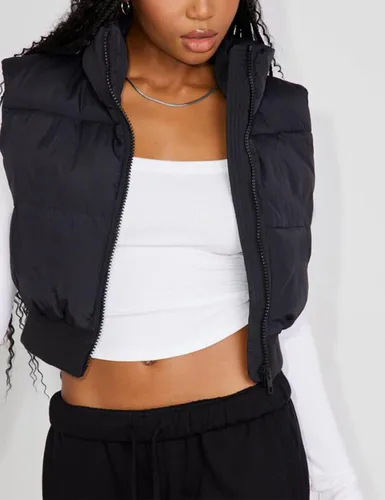 Vista 3 de Flygo Chaleco acolchado recortado con cremallera y cuello alto sin mangas acolchado para mujer