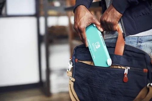Vista 4 de Nintendo Switch Lite - Turquoise (Renewed Premium)