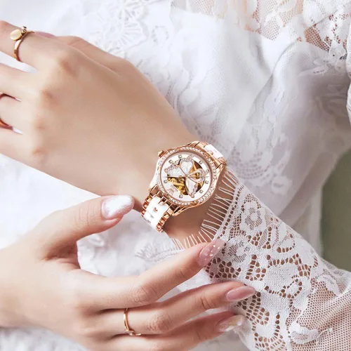 Vista 2 de OLEVS Relojes de oro rosa para mujer correa de acero inoxidable de cerámica reloj mecánico automático calendario de puntero luminoso impermeable