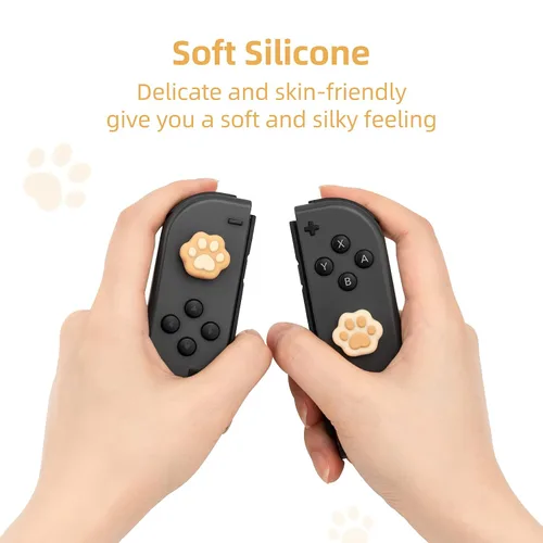 Vista 3 de GeekShare Cat Paw Shape Thumb Grip Caps,Soft Silicone Joystick Cover Compatible with Nintendo Switch OLED Switch Lite (Brown & Yellow)