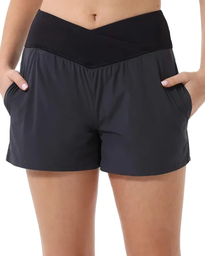Vista 2 de HARTPOR Pantalones cortos deportivos 2 en 1 de secado rápido para mujer, cintura cruzada con bolsillos, forro de malla para entrenamiento, gimnasio
