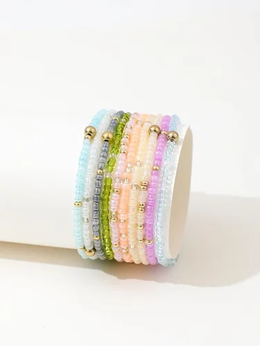 Vista 4 de Caiyao 12 pulseras apilables con cuentas de resina multicapa bohemia, pulseras elásticas de cuentas de cristal de colores, pulseras elásticas de 10