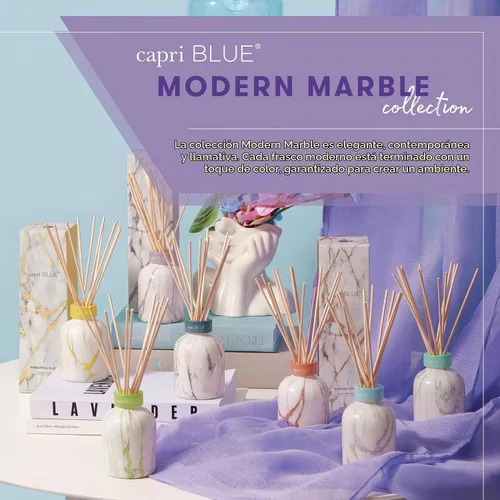 Vista 6 de Capri Blue Conjunto de Difusor de Varillas con Diseño de Mármol Moderno - Incluye varillas difusoras de junco, aceite perfumado y botella de vidrio