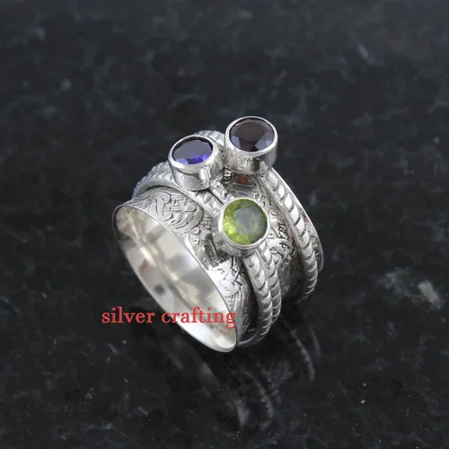 Vista 3 de Anillo giratorio de plata de ley con piedra preciosa de peridoto y granate