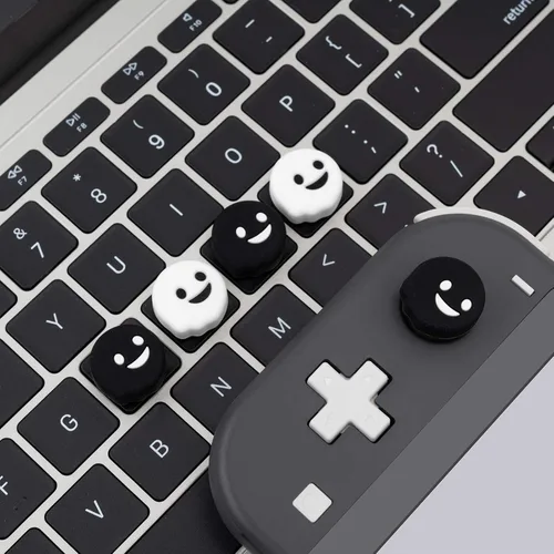 Vista 7 de GeekShare 4PCS Cute Ghost Thumb Grip Caps,Halloween Soft Silicone Joystick Cover Compatible with Nintendo SwitchOLEDSwitch Lite - Black&White
