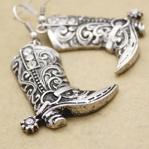 Vista 3 de RechicGu Botas vaqueras del oeste del oeste de Texas con diseño de espur colgantes, aretes colgantes de Rodeo Boho