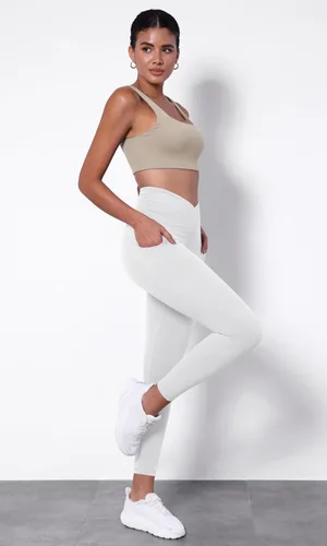 Vista 3 de ODODOS Leggings de yoga con cintura cruzada para mujer con bolsillos, pantalones de yoga de entrenamiento cruzado de 2528 pulgadas