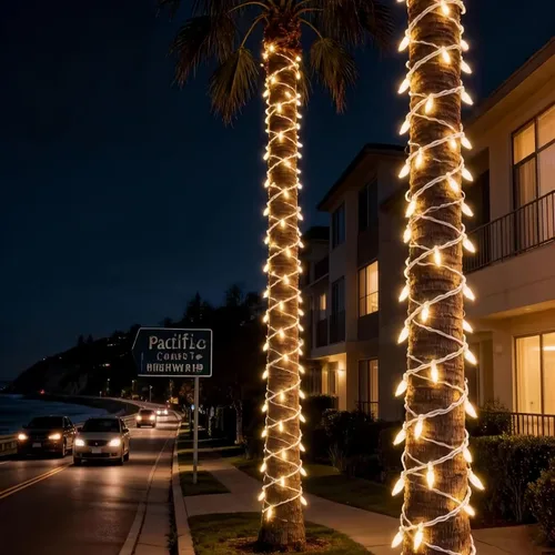 Vista 2 de 100 luces LED de Navidad de color blanco cálido, tira de luces con cable blanco de 35 pies, certificación UL, calidad comercial, para árboles