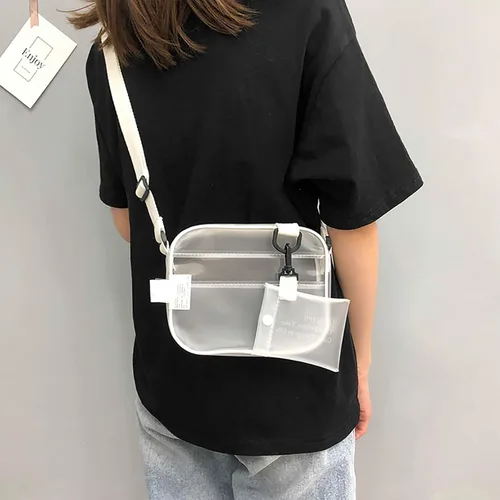Vista 2 de Enkrio Bolsa transparente aprobada para estadios, mini bolsa de mensajero mate con correa ajustable para mujeres y hombres