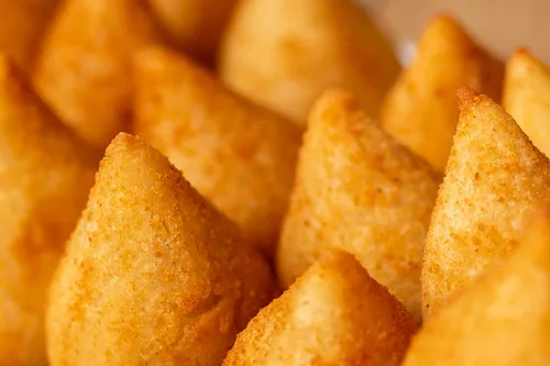 Vista 5 de Coxinhas XL 5 paquetes (5 unidades cada paquete) Croquetas de pollo brasileñas XL - El aperitivo perfecto (sin desastre) - Coxinha brasileña