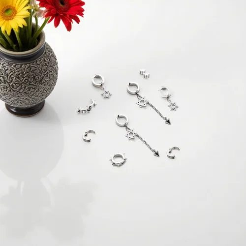 Vista 3 de Juego de 5 pares de aretes de aro de acero inoxidable negro sin perforación, remaches cruzados y borla para mujeres, hombres, niños y niñas, aretes
